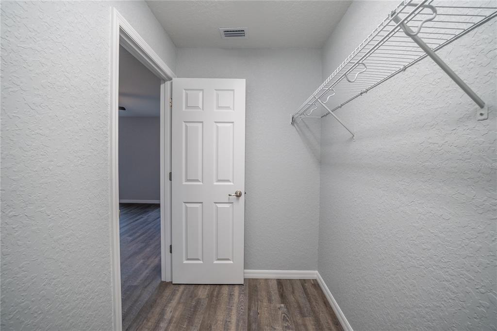 15673 Southwest 37th Circle Ocala, FL 34473 - Photo 9 of 19 a view of a room with wooden floor