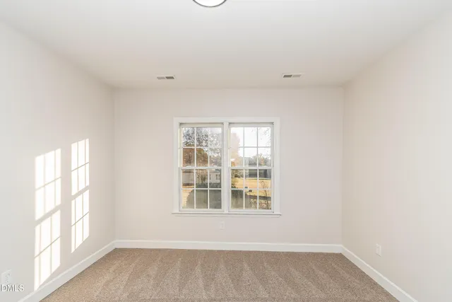 an empty room with a window