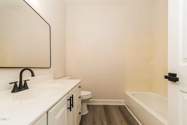 a bathroom with a sink and a vanity