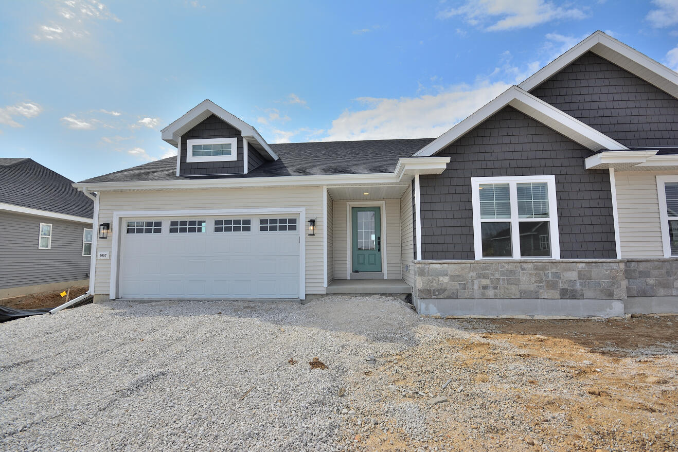 1057 Elderberry Road Oconomowoc, WI 53066 - Photo 1 of 31 83 ARWT (2)