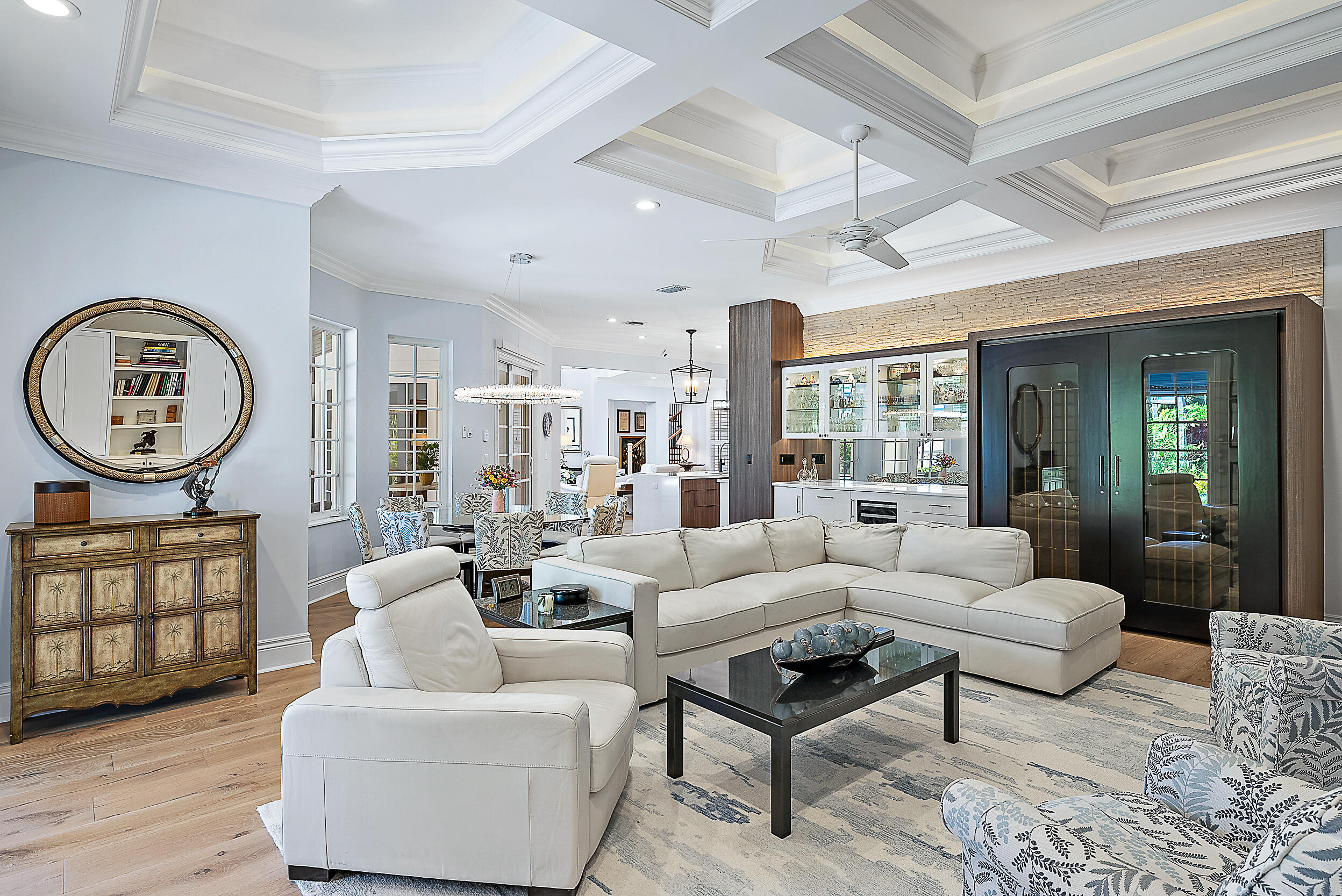 11971 Southeast Tiffany Way Jupiter, FL 33469 - Photo 16 of 53 a living room with furniture a rug and a large window