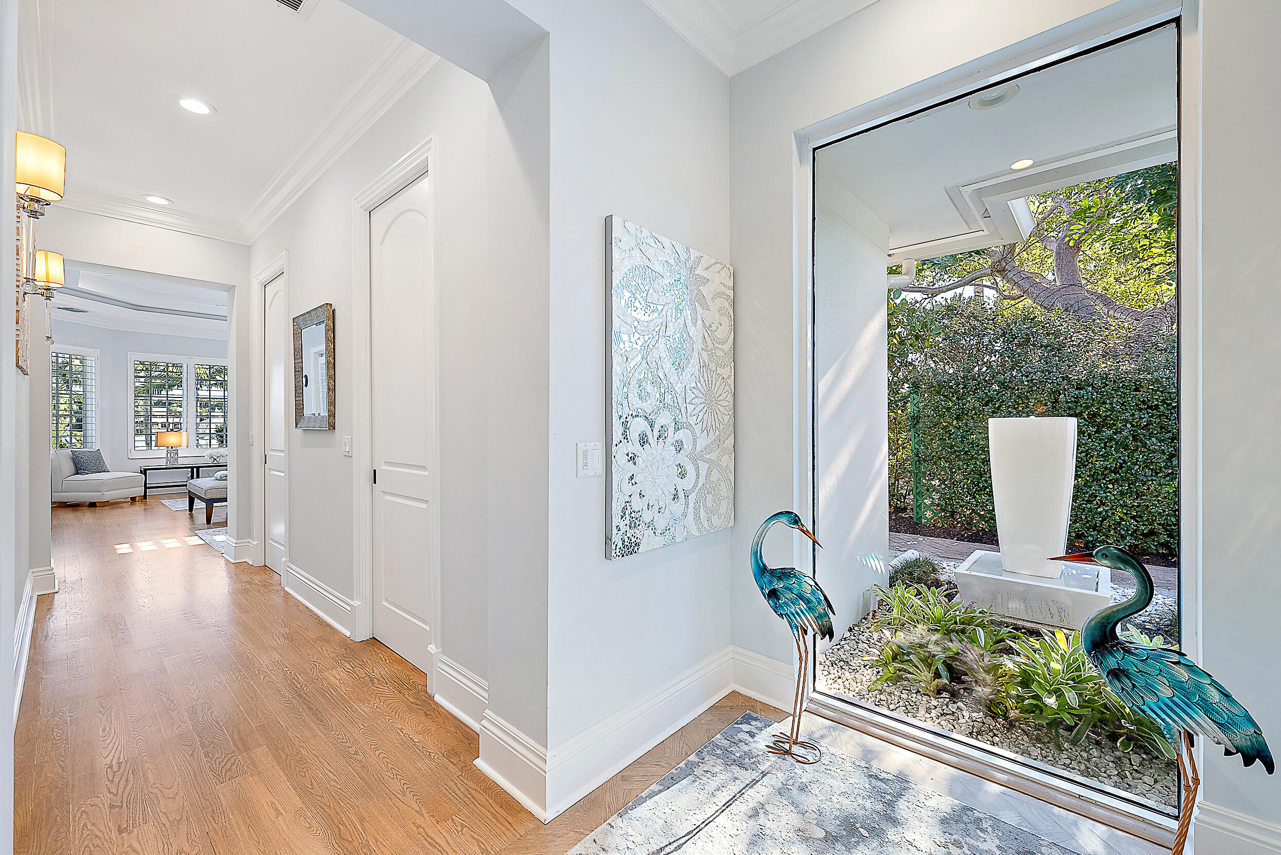 11971 Southeast Tiffany Way Jupiter, FL 33469 - Photo 19 of 53 a view of livingroom with furniture wooden floor and front door