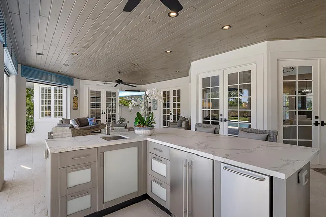 a view of kitchen with furniture and wooden floor