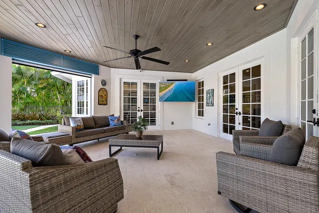 a spacious bedroom with a bed and a window