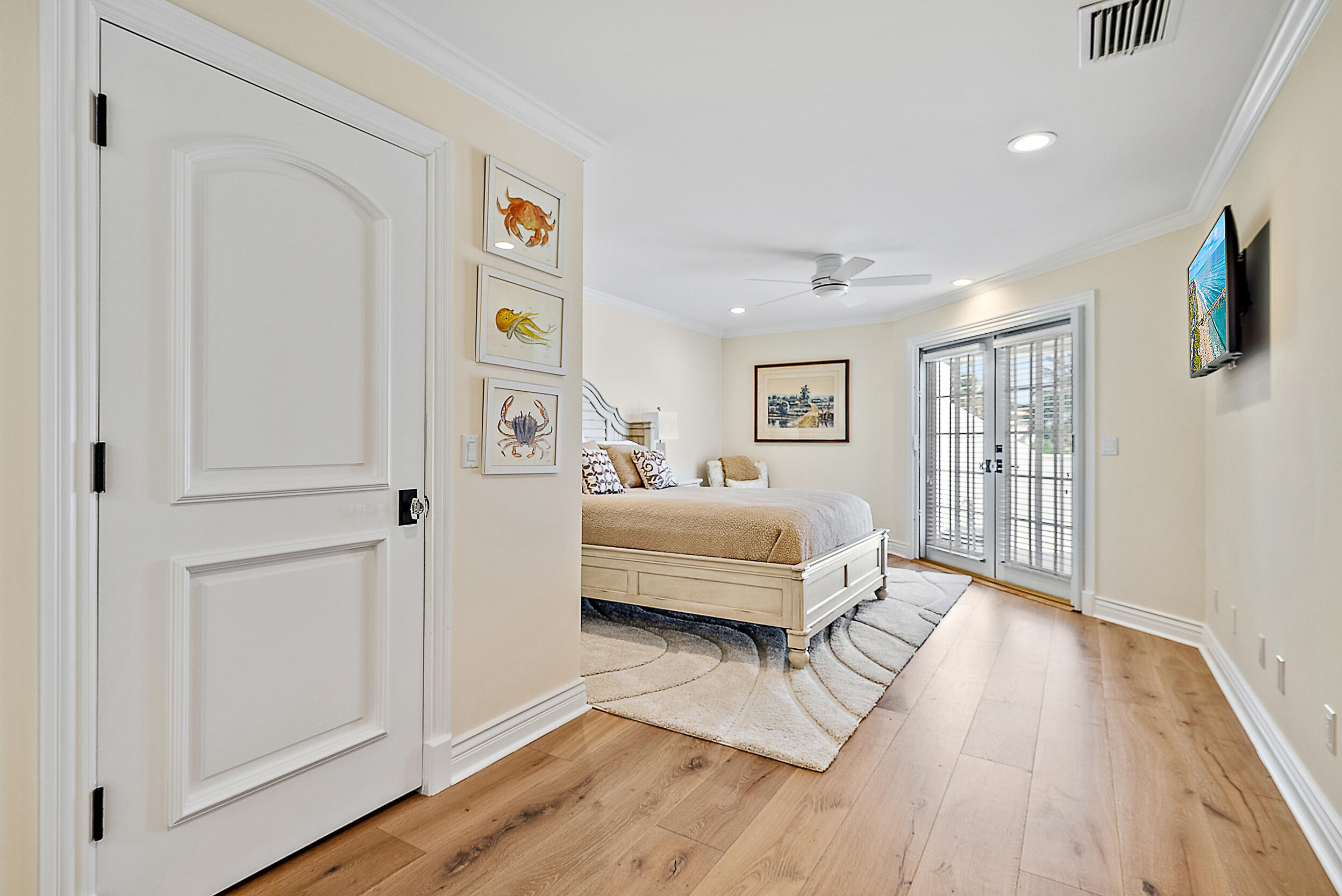 11971 Southeast Tiffany Way Jupiter, FL 33469 - Photo 30 of 53 a spacious bedroom with a bed and a window