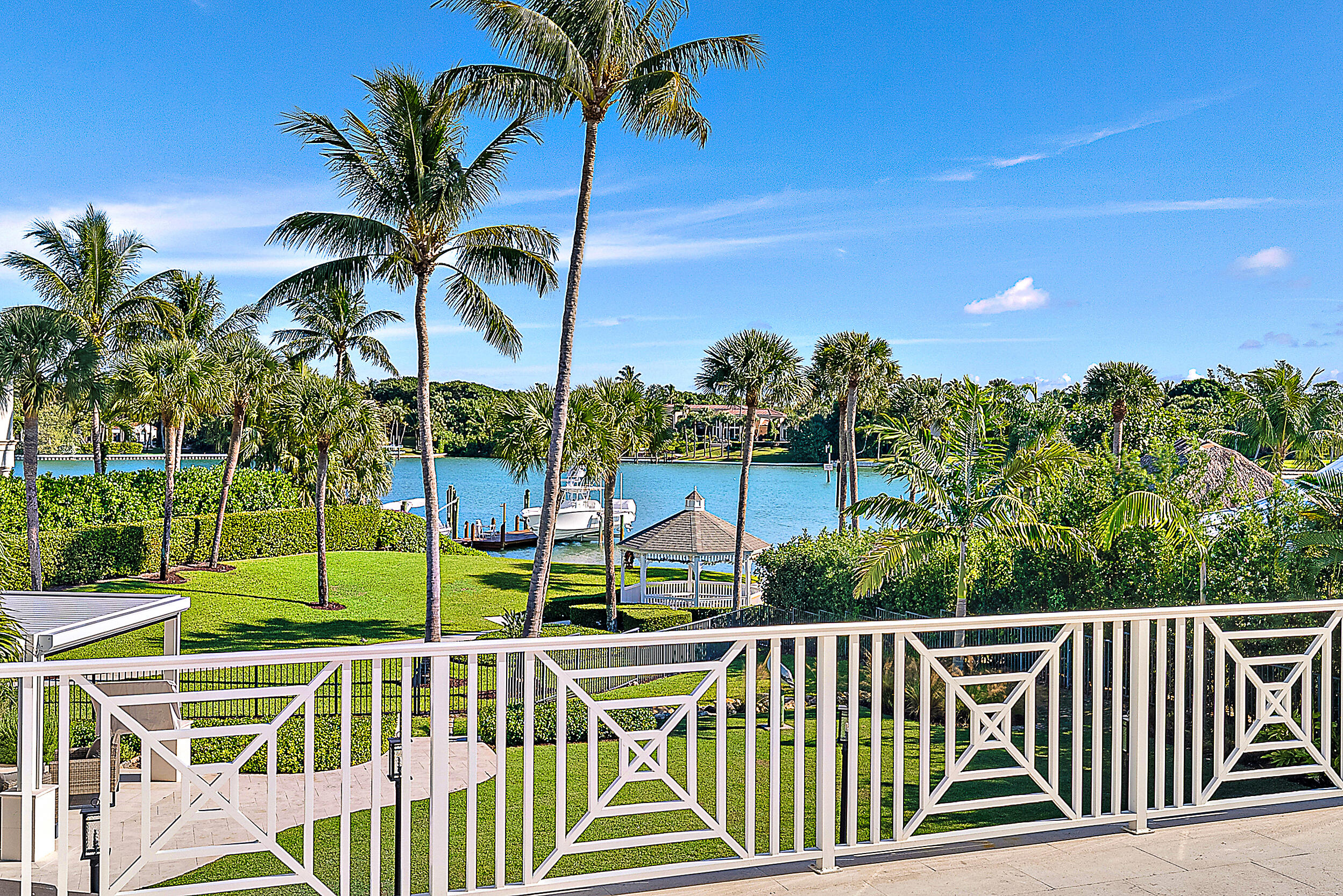 11971 Southeast Tiffany Way Jupiter, FL 33469 - Photo 3 of 53 a view of a swimming pool with a garden and plants