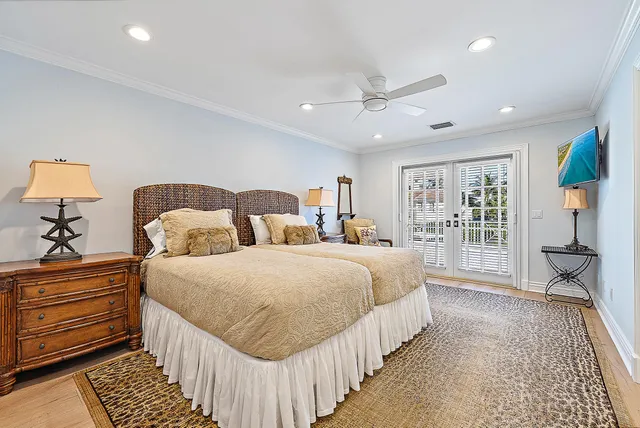 a view of a patio with couches chairs and a big yard