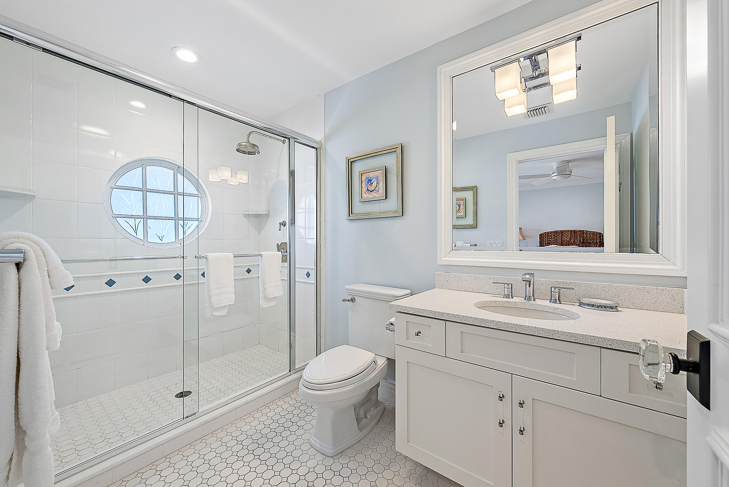 11971 Southeast Tiffany Way Jupiter, FL 33469 - Photo 34 of 53 a bathroom with a sink a toilet and shower