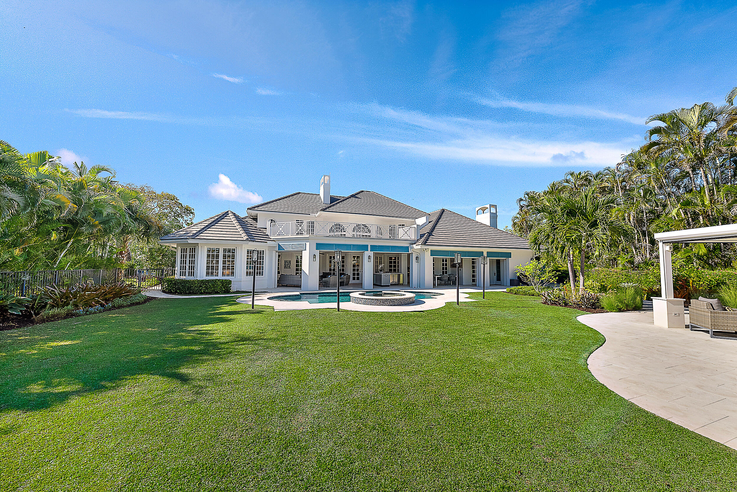 11971 Southeast Tiffany Way Jupiter, FL 33469 - Photo 35 of 53 a front view of a house with garden