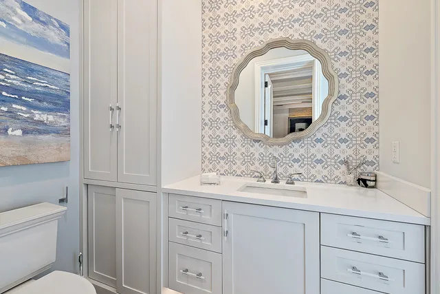 an aerial view of a house with outdoor space