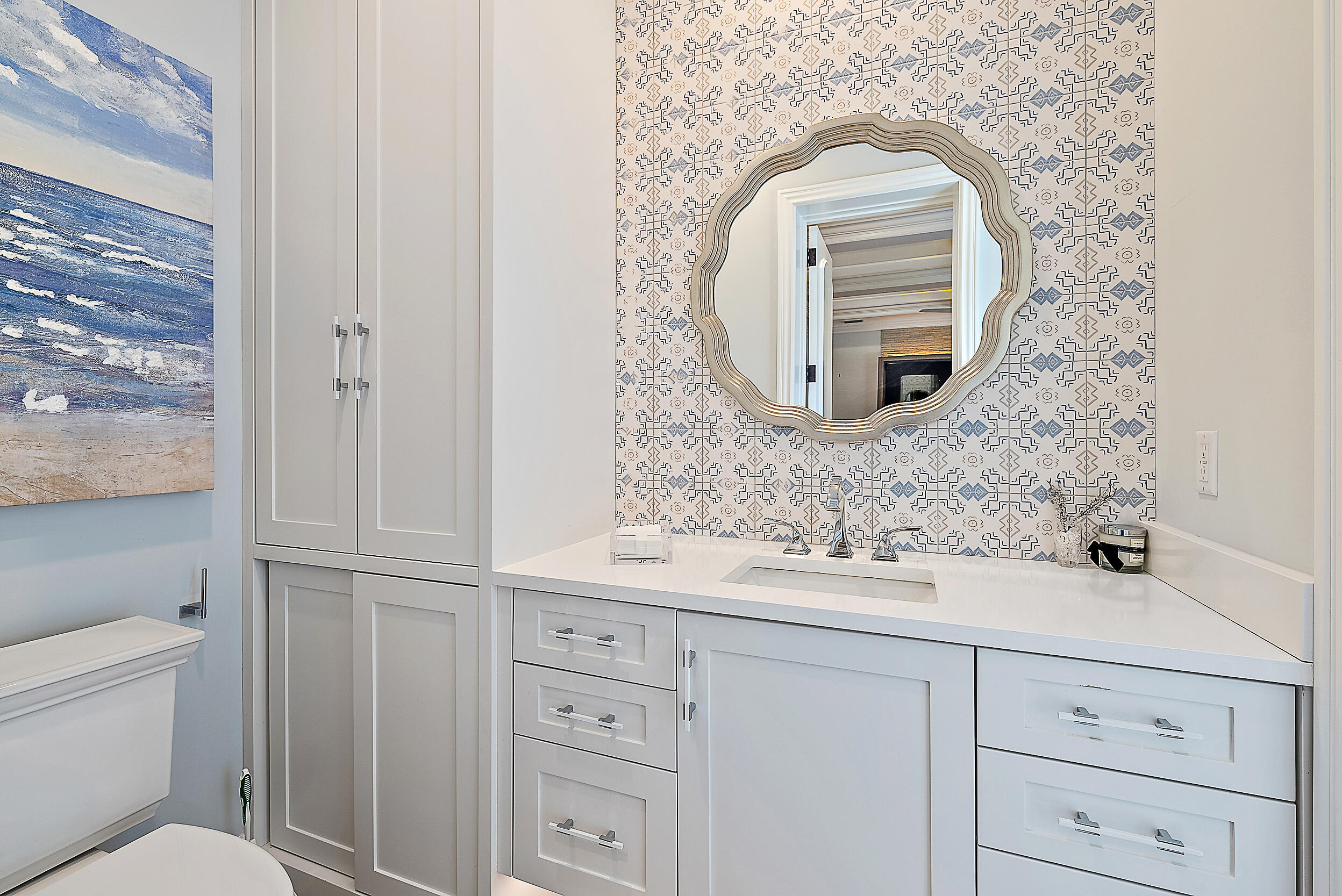 11971 Southeast Tiffany Way Jupiter, FL 33469 - Photo 43 of 53 a bathroom with a sink and mirror