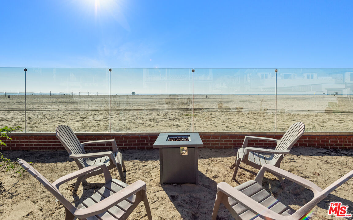 605 Palisades Beach Road Santa Monica, CA 90402 - Photo 1 of 33 a view of a terrace with chairs
