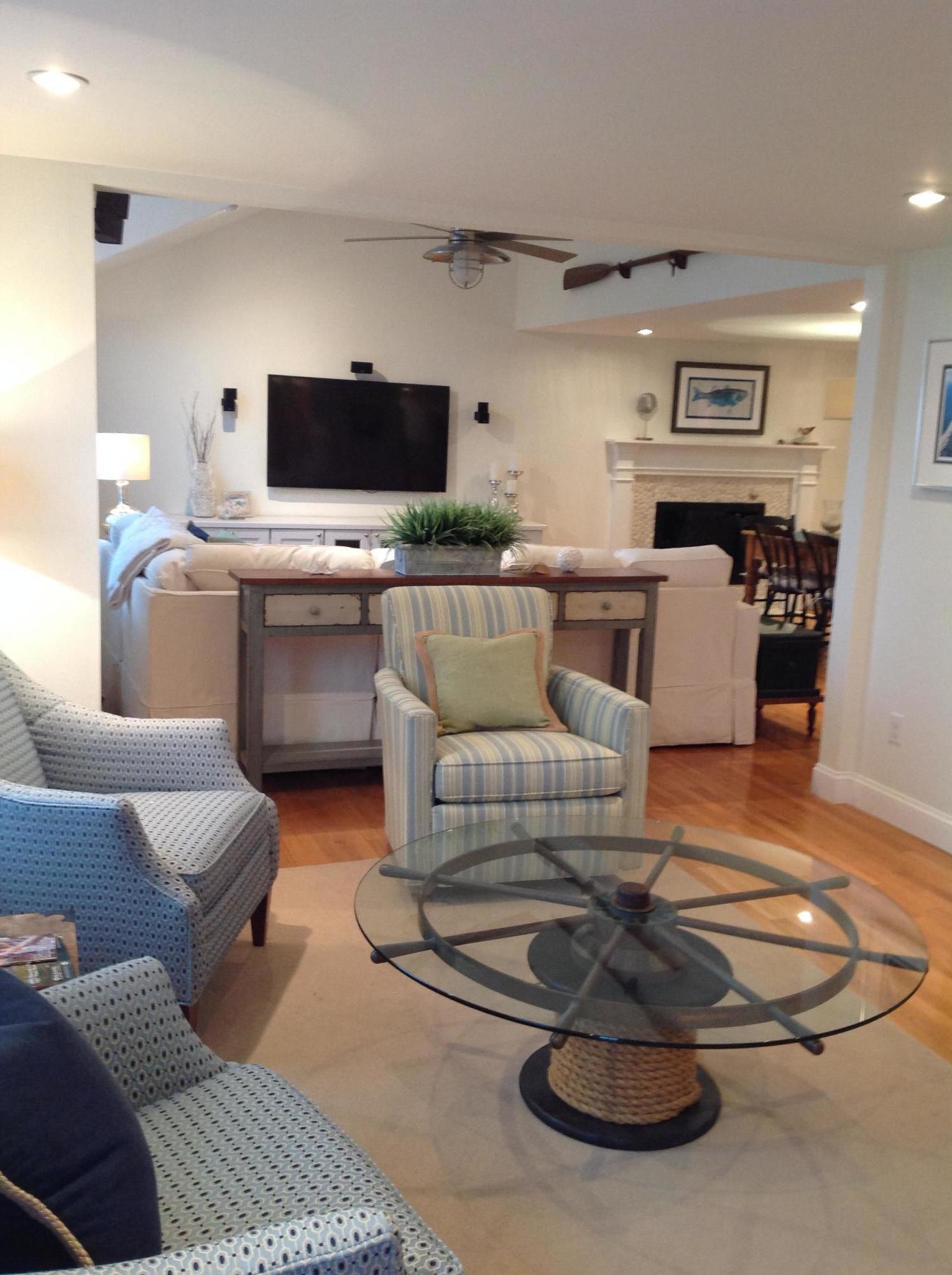 3 Riverview Drive Orleans, MA 02653 - Photo 24 of 63 a living room with furniture and a flat screen tv