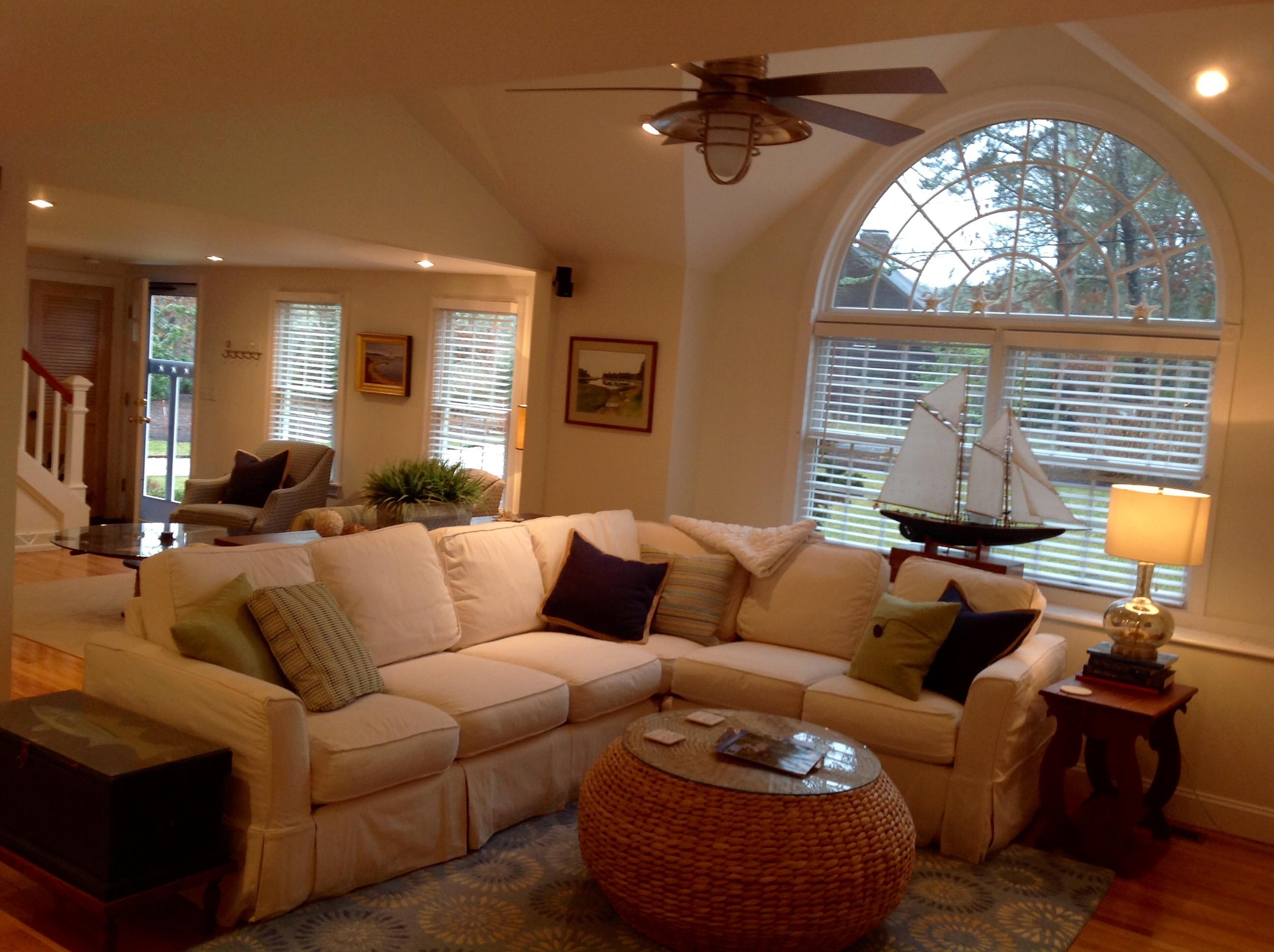 3 Riverview Drive Orleans, MA 02653 - Photo 27 of 63 a living room with furniture and a large window