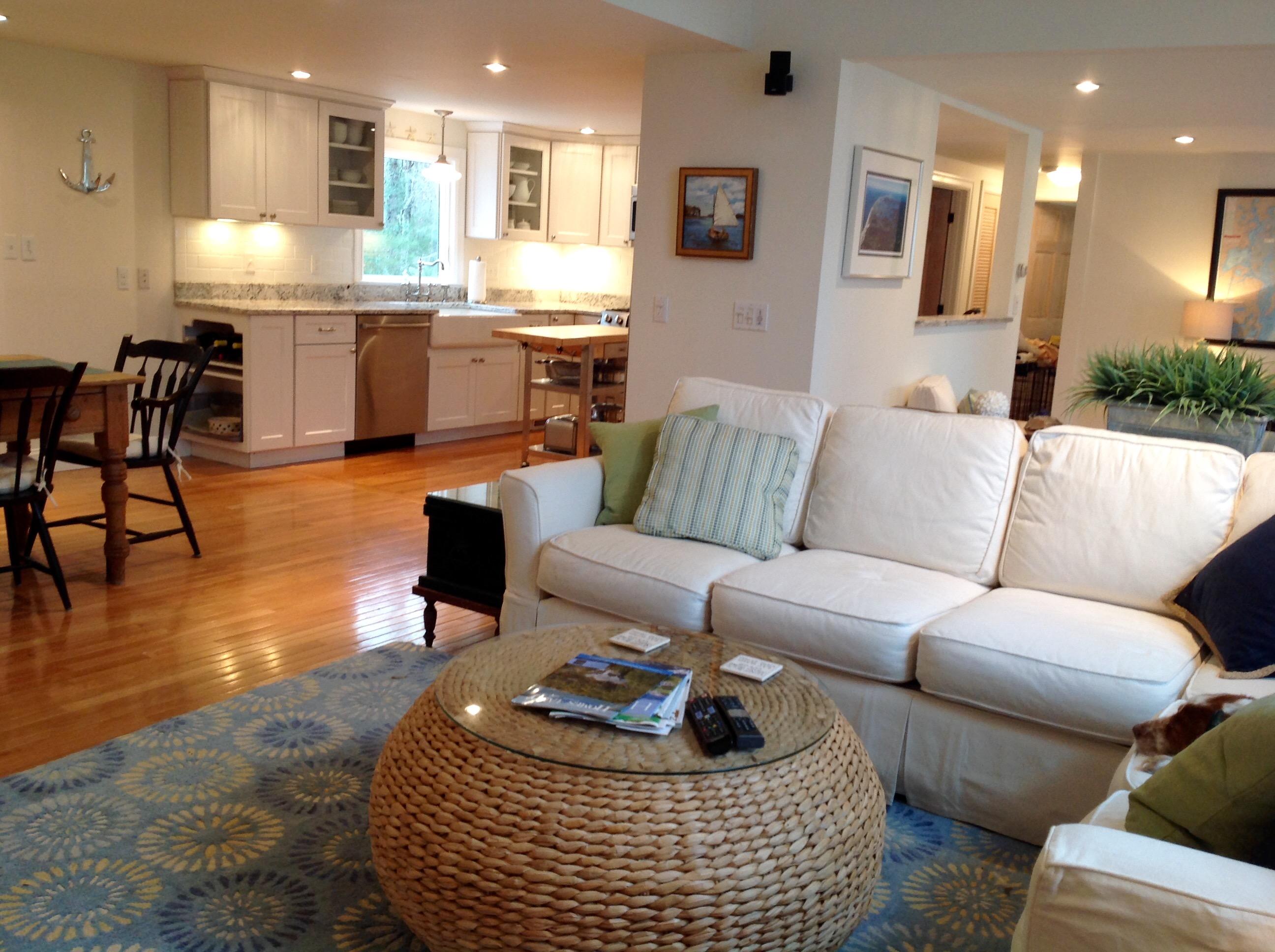 3 Riverview Drive Orleans, MA 02653 - Photo 29 of 63 a living room with furniture kitchen and a dining table