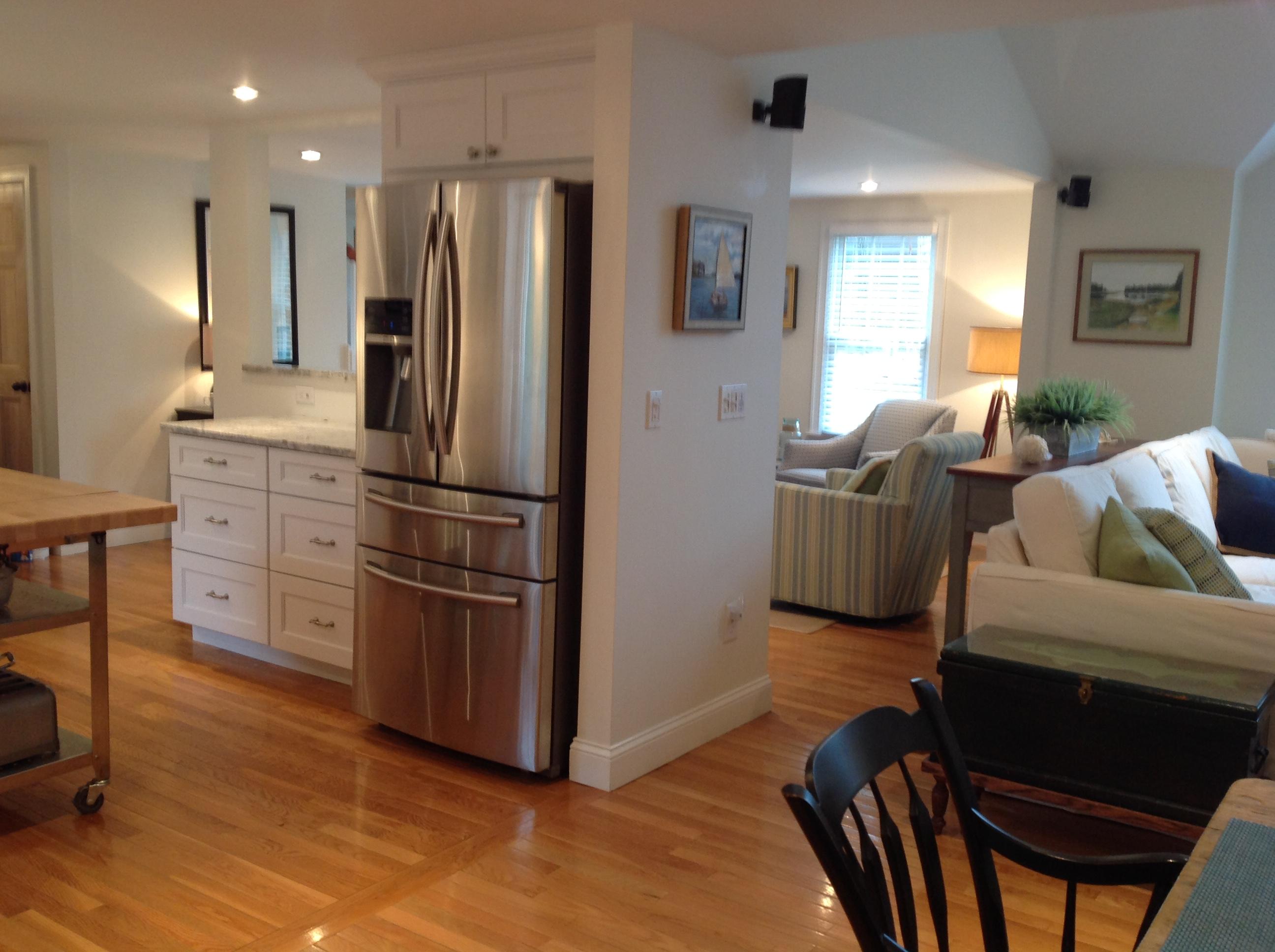 3 Riverview Drive Orleans, MA 02653 - Photo 30 of 63 a kitchen with stainless steel appliances granite countertop a refrigerator a stove a sink dishwasher and a refrigerator with wooden floor
