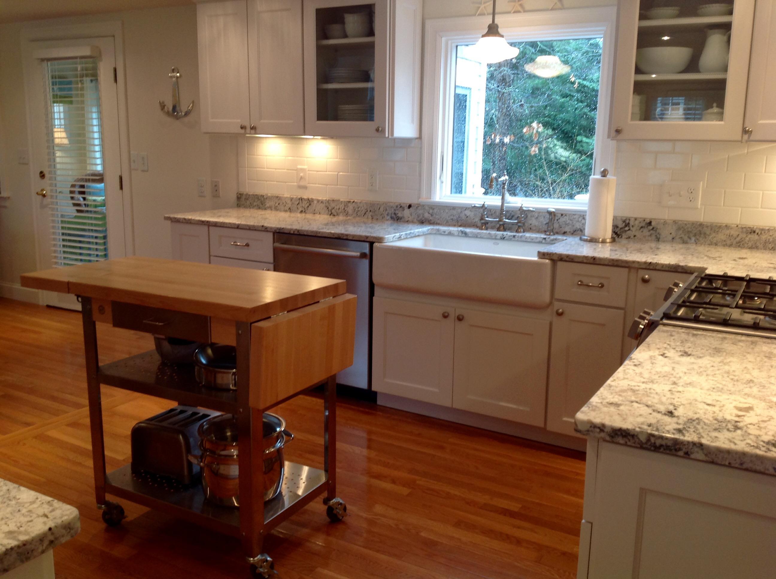 3 Riverview Drive Orleans, MA 02653 - Photo 31 of 63 a kitchen with stainless steel appliances granite countertop a stove a sink and a microwave