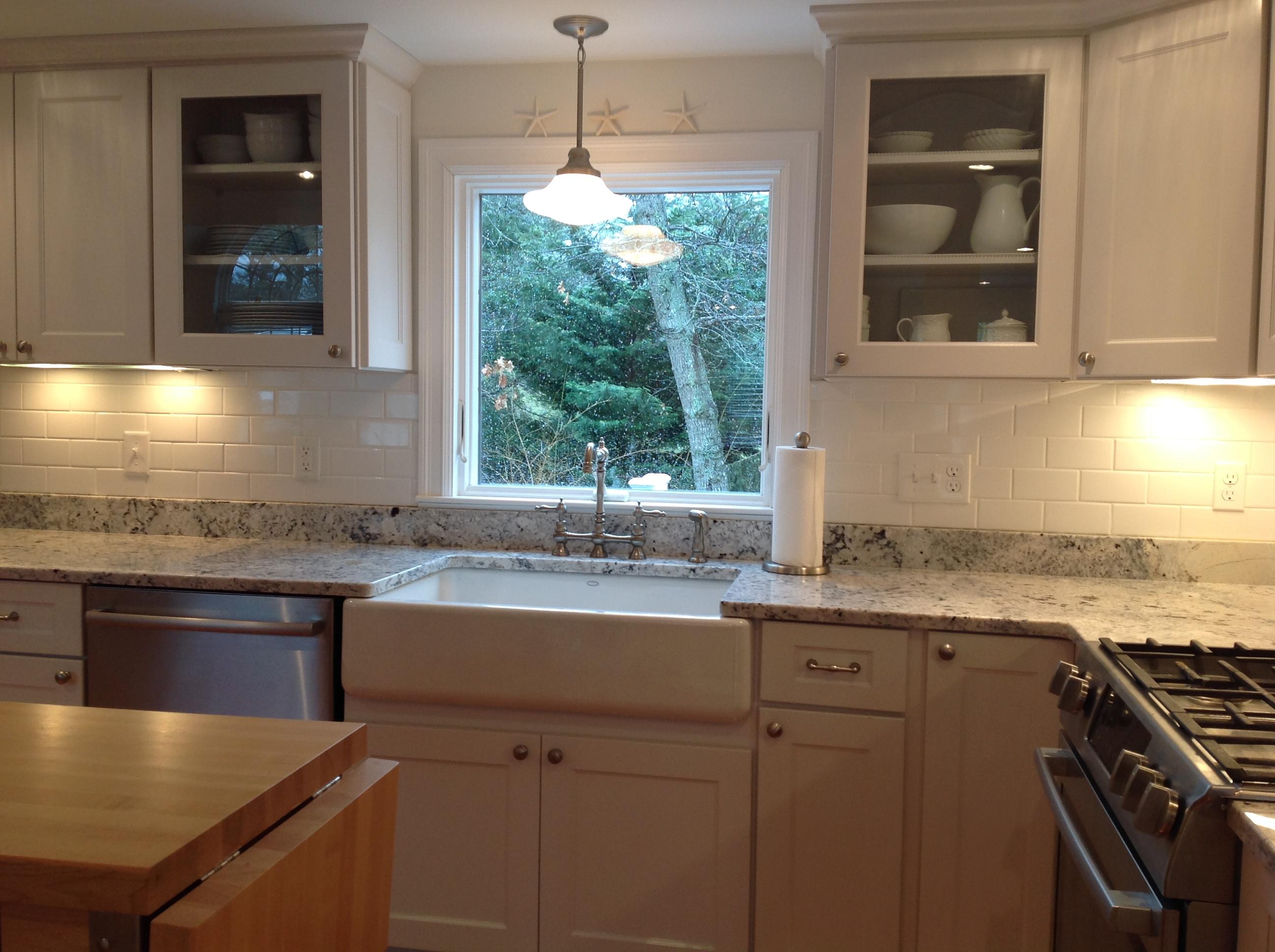 3 Riverview Drive Orleans, MA 02653 - Photo 32 of 63 a kitchen with granite countertop a sink and a stove