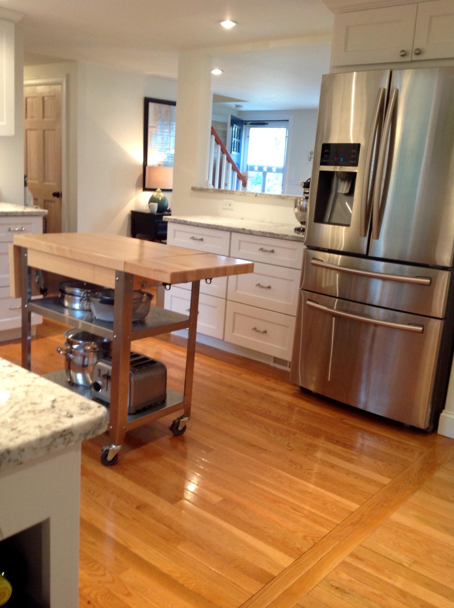 3 Riverview Drive Orleans, MA 02653 - Photo 33 of 63 a kitchen with kitchen island a counter top space cabinets and stainless steel appliances