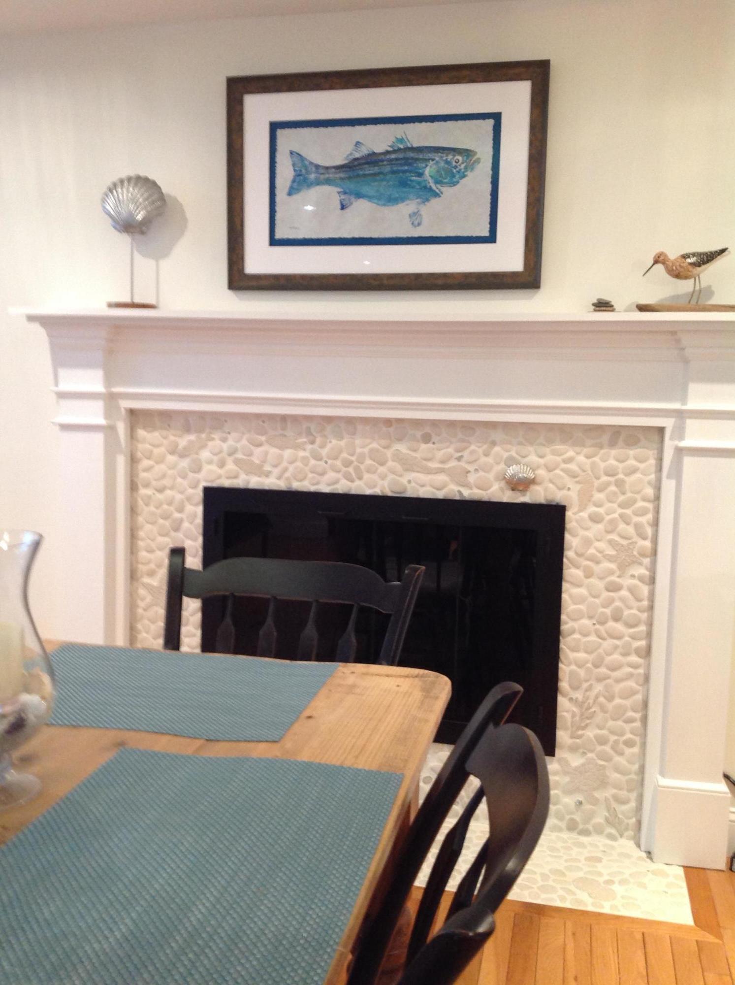 3 Riverview Drive Orleans, MA 02653 - Photo 37 of 63 a view of an empty room with fireplace and wooden floor