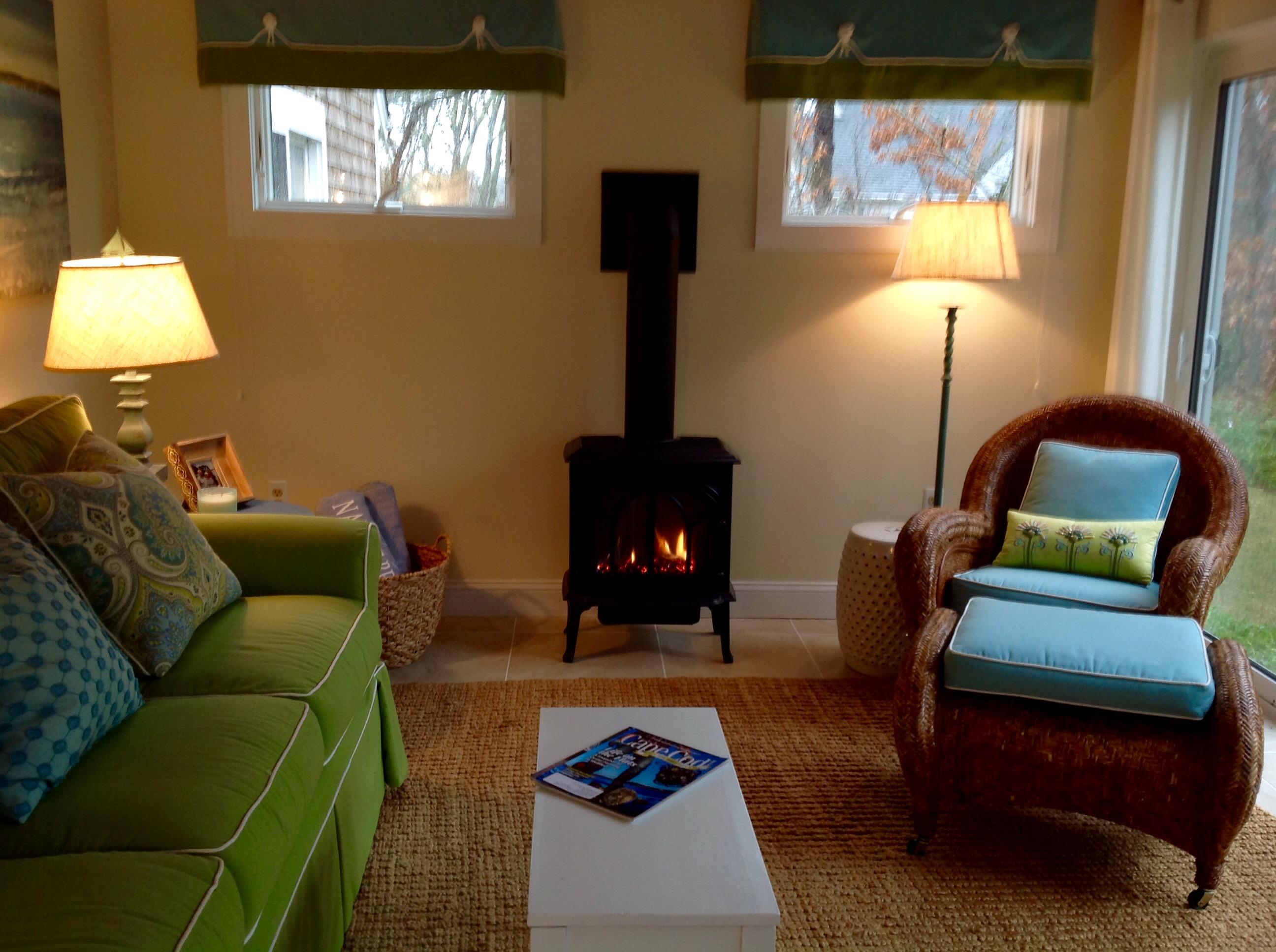 3 Riverview Drive Orleans, MA 02653 - Photo 40 of 63 a living room with furniture and a lamp