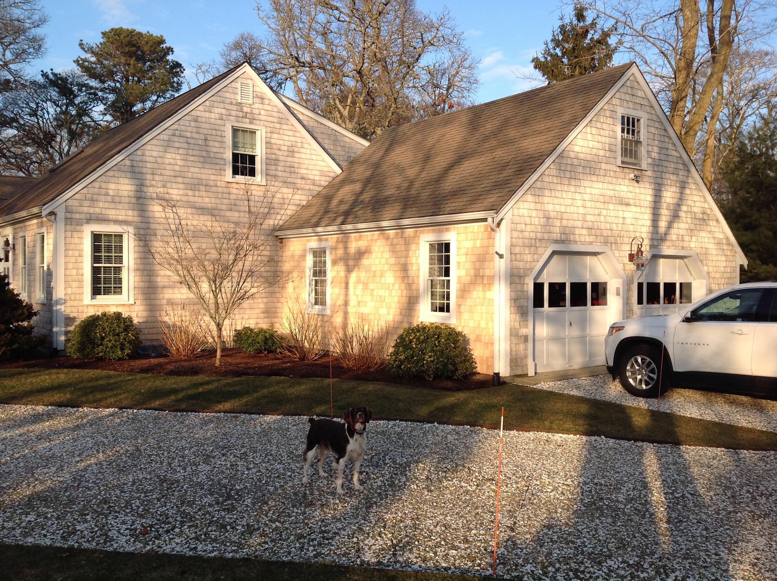3 Riverview Drive Orleans, MA 02653 - Photo 5 of 63 a view of a white house next to a yard