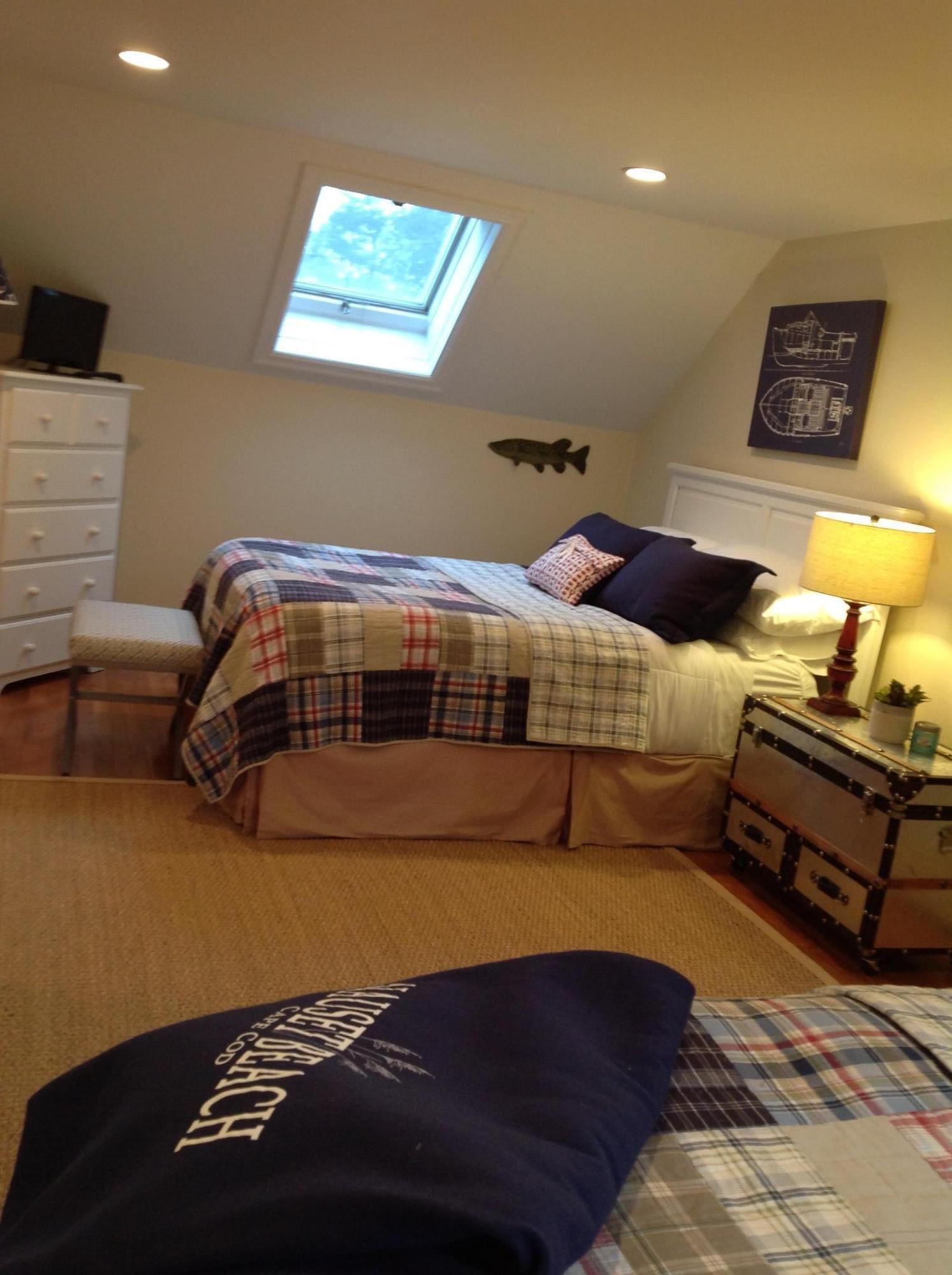 3 Riverview Drive Orleans, MA 02653 - Photo 52 of 63 a bedroom with a bed and dresser