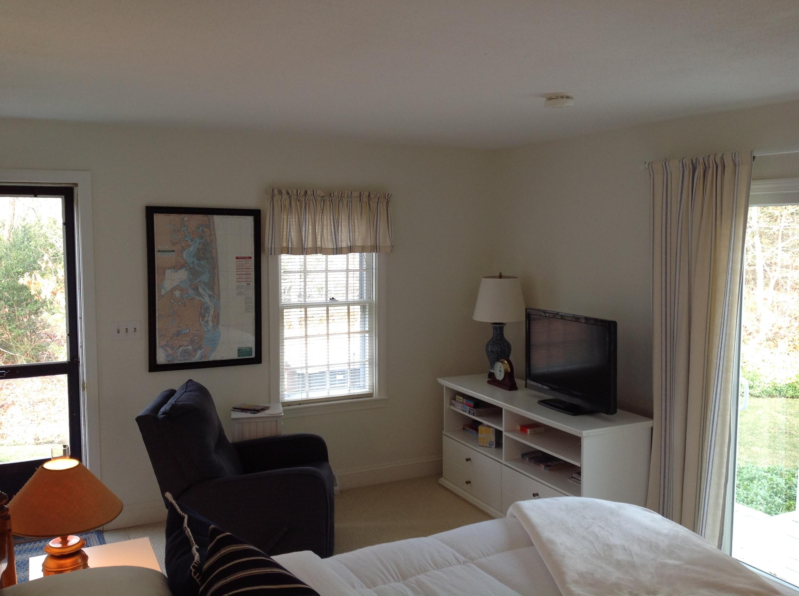 3 Riverview Drive Orleans, MA 02653 - Photo 62 of 63 a living room with furniture and a flat screen tv