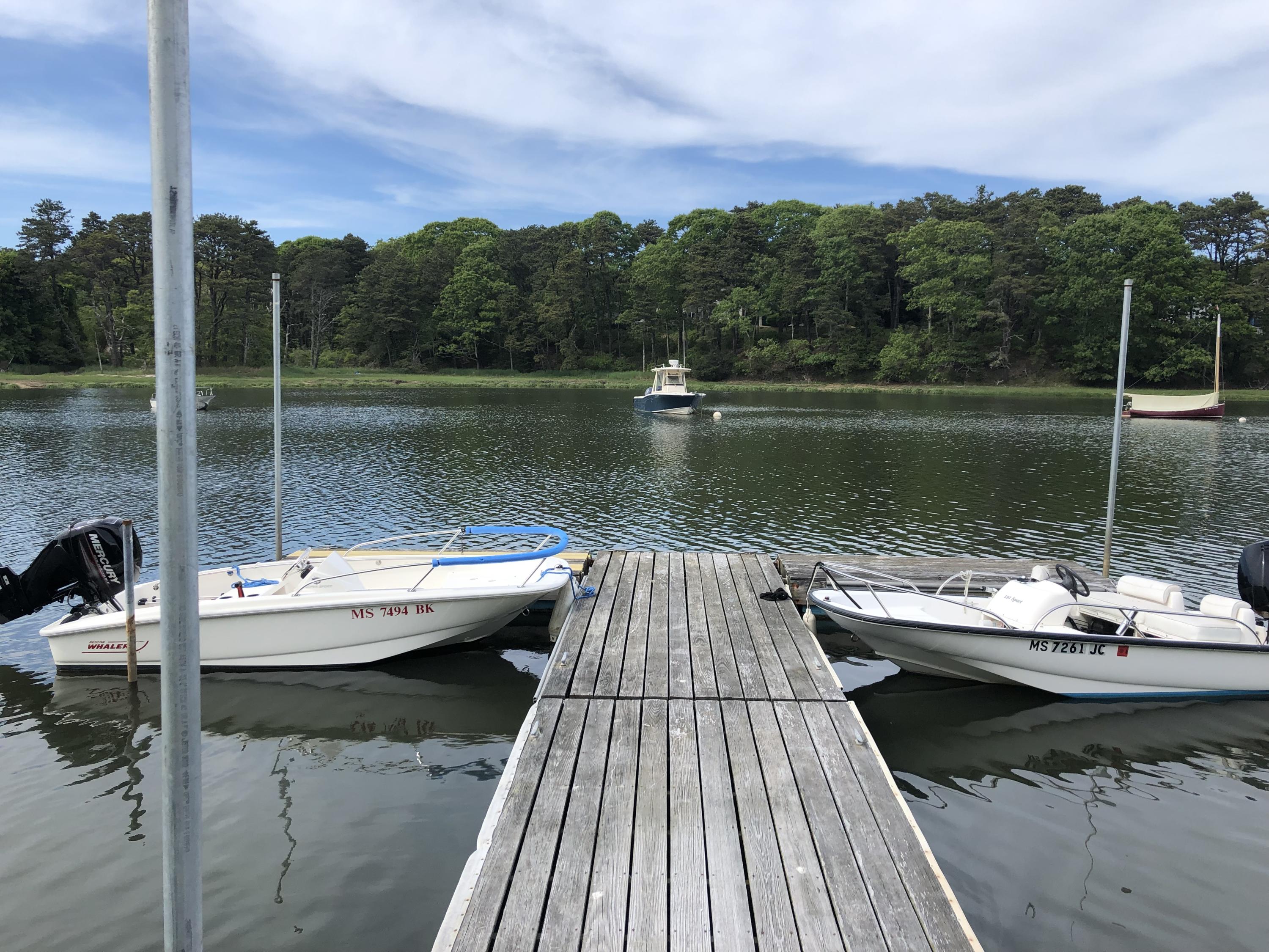 3 Riverview Drive Orleans, MA 02653 - Photo 7 of 63 a view of a lake with a terrace