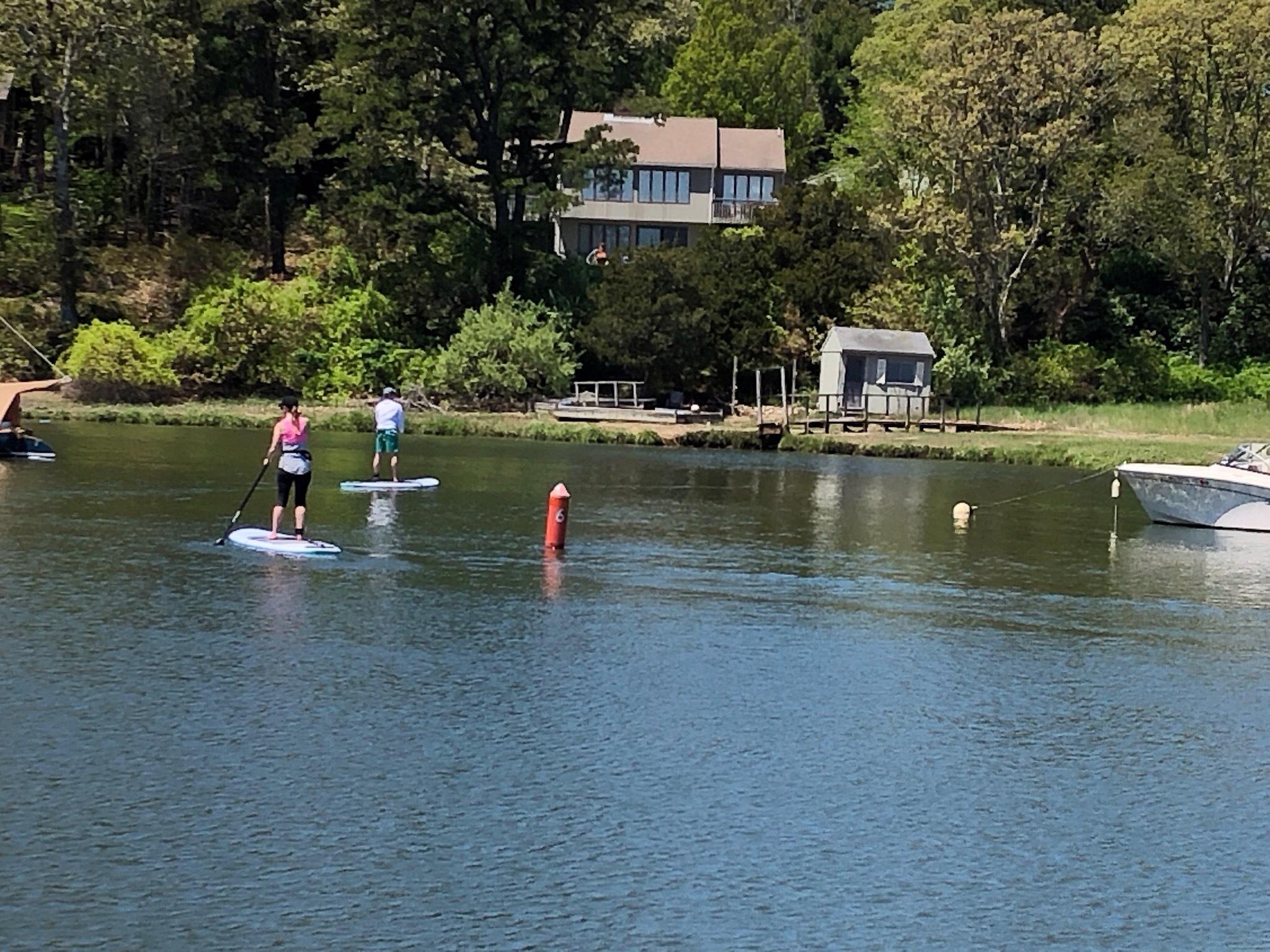3 Riverview Drive Orleans, MA 02653 - Photo 10 of 63 a front view of a house with a yard