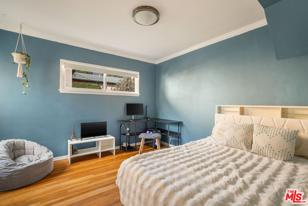 3024 Highview Avenue Altadena, CA 91001 - Photo 13 of 25 a bedroom with bed and a couch