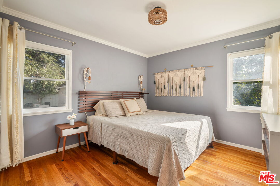 3024 Highview Avenue Altadena, CA 91001 - Photo 14 of 25 a bedroom with a bed and a window