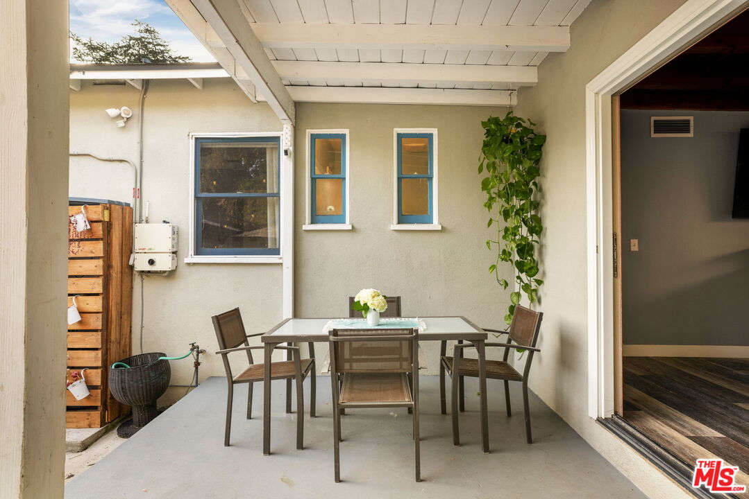 3024 Highview Avenue Altadena, CA 91001 - Photo 17 of 25 a view of a dining room with furniture and chandelier