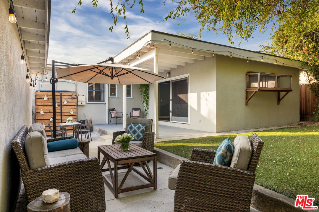 3024 Highview Avenue Altadena, CA 91001 - Photo 20 of 25 a view of a patio with couches table and chairs and potted plants
