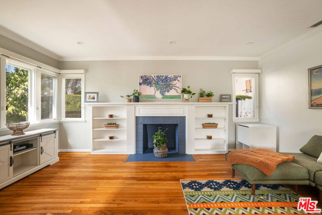 3024 Highview Avenue Altadena, CA 91001 - Photo 6 of 25 a living room with furniture and a fireplace