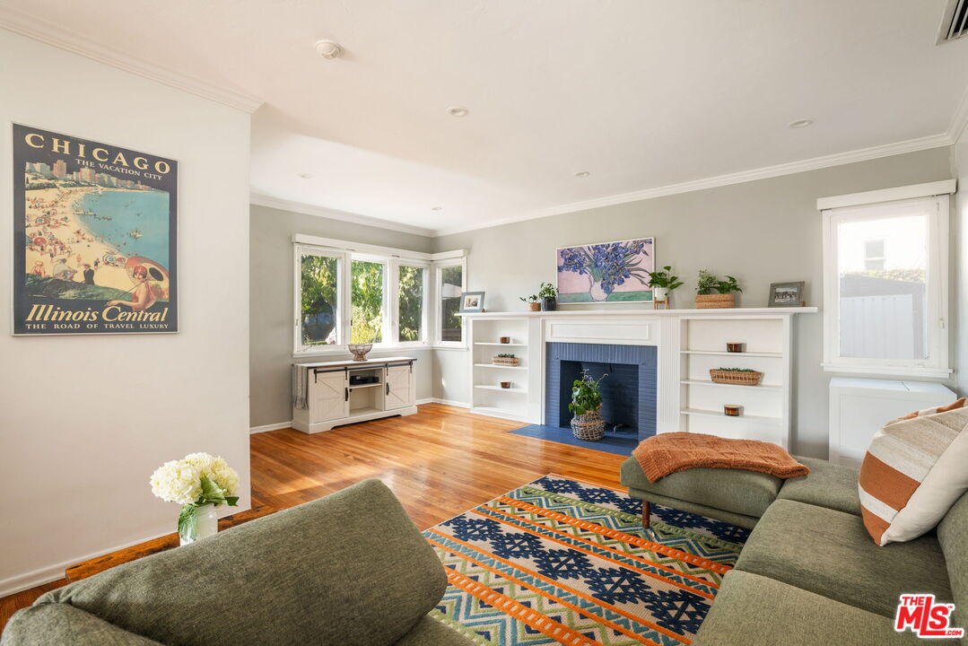 3024 Highview Avenue Altadena, CA 91001 - Photo 8 of 25 a living room with furniture and a fireplace