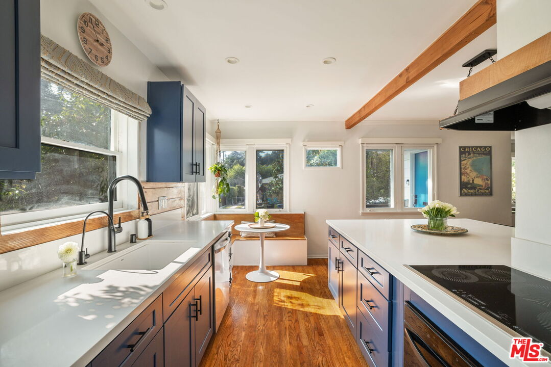 3024 Highview Avenue Altadena, CA 91001 - Photo 10 of 25 a kitchen with granite countertop a sink and a stove top oven