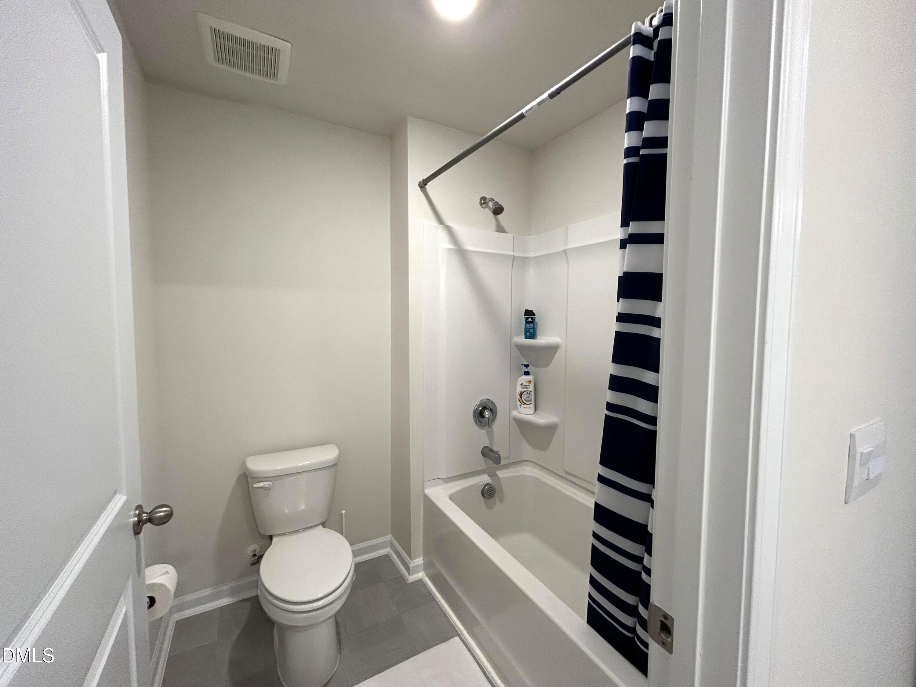 2264 Fletchers Ridge Drive Durham, NC 27703 - Photo 33 of 41 26. Shower and water closet bedroom 4 an