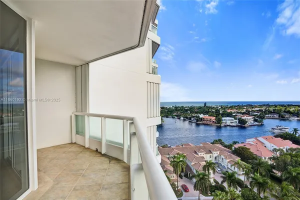 a view of a terrace with outdoor seating and city view