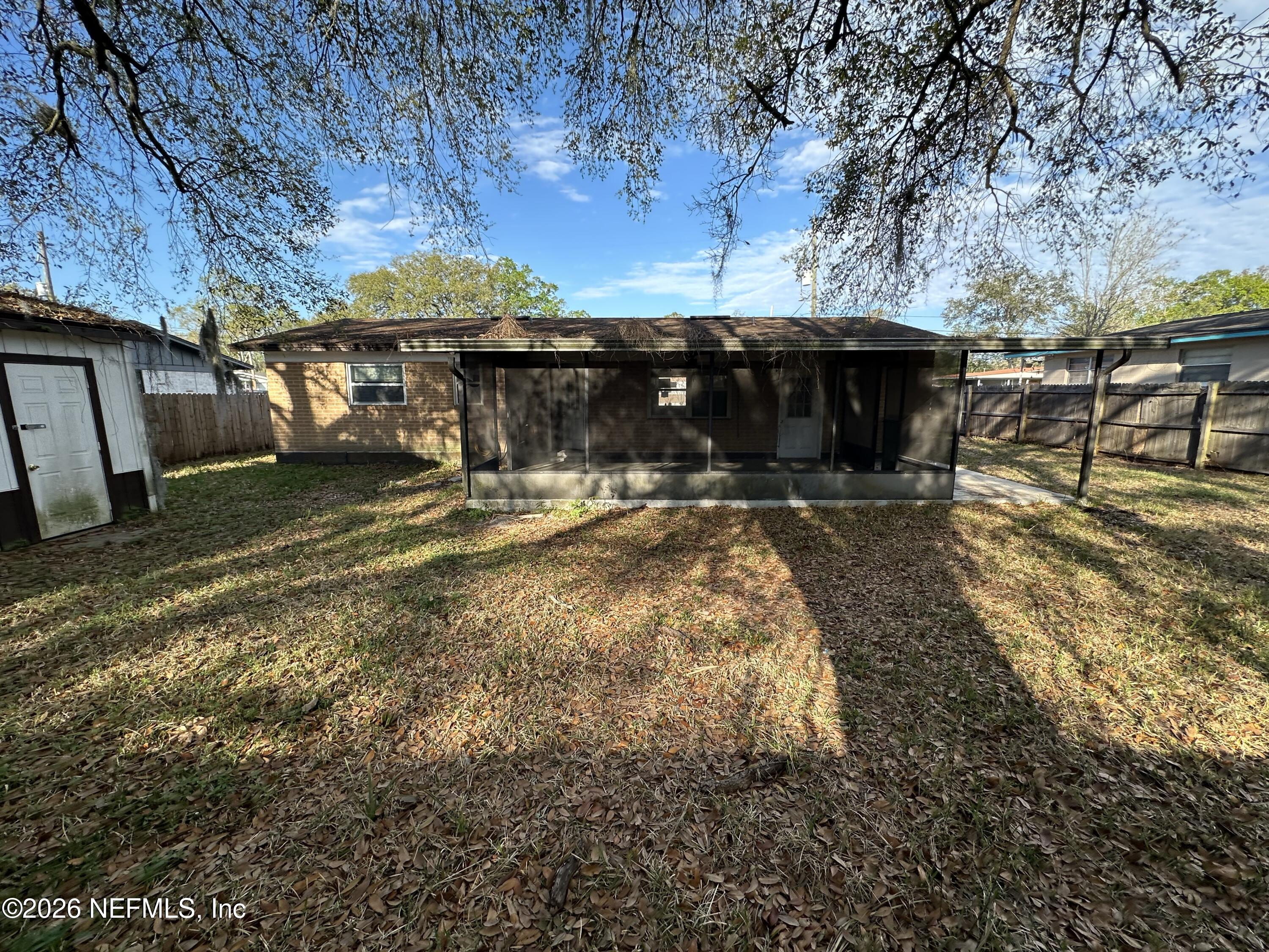 4435 Rainer Road Jacksonville, FL 32210 - Photo 2 of 14 a view of a house with backyard