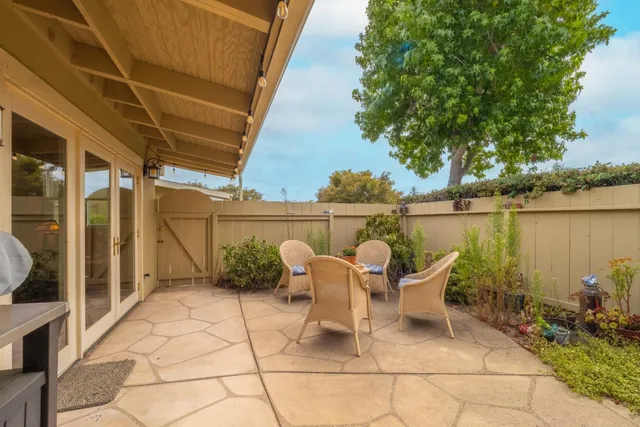 a chairs and table on a patio