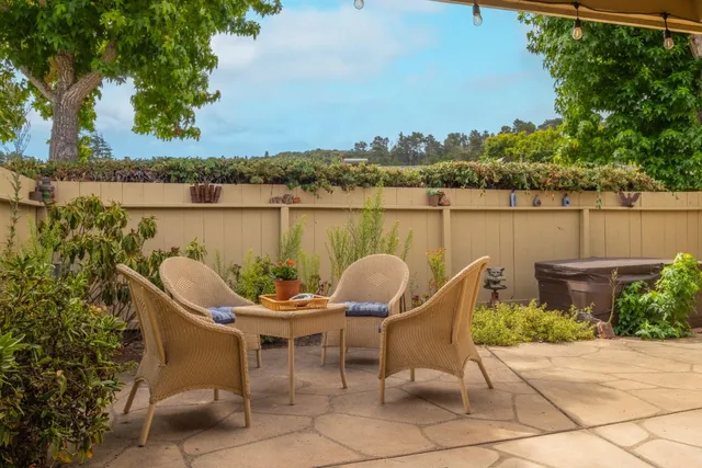 a chairs and table sitting in a lake with a table and chair