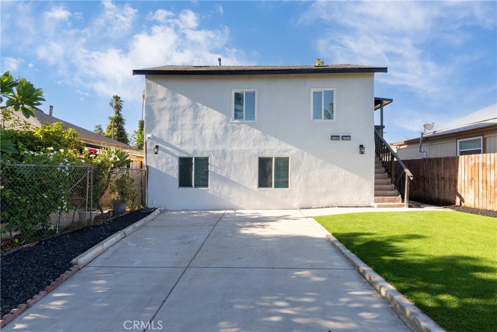 2127 Tenth Street, Unit A Riverside, CA 92507 - Photo 1 of 13 a front view of house with yard