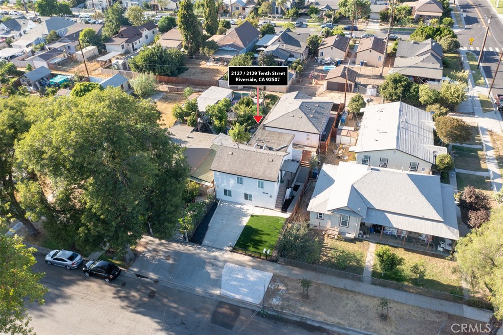 2127 Tenth Street, Unit A Riverside, CA 92507 - Photo 4 of 13 an aerial view of residential houses with outdoor space