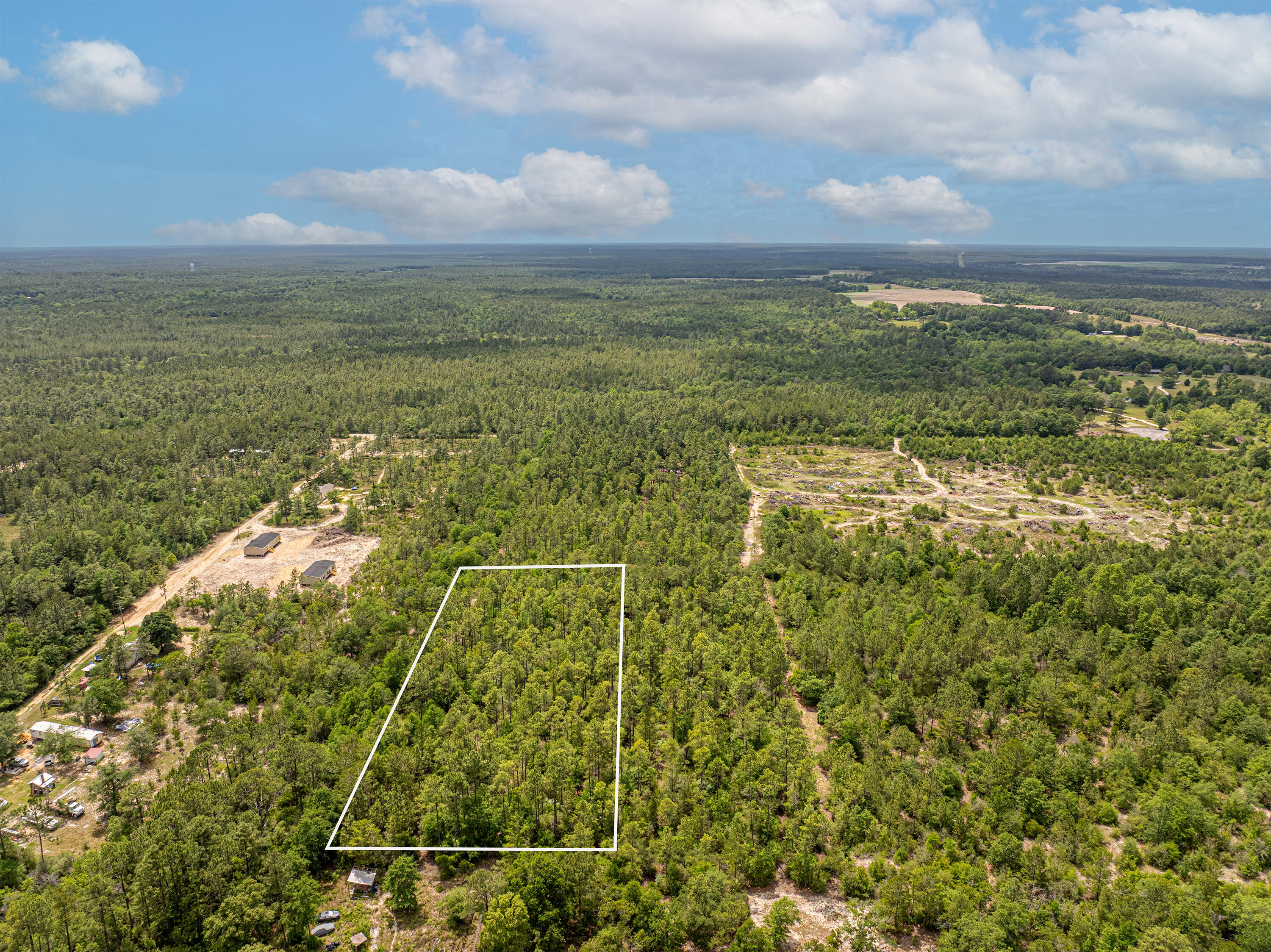 2.5-acres Coventry Road, Unit LOT A DeFuniak Springs, FL 32433 - Photo 8 of 8 a view of yard with ocean view