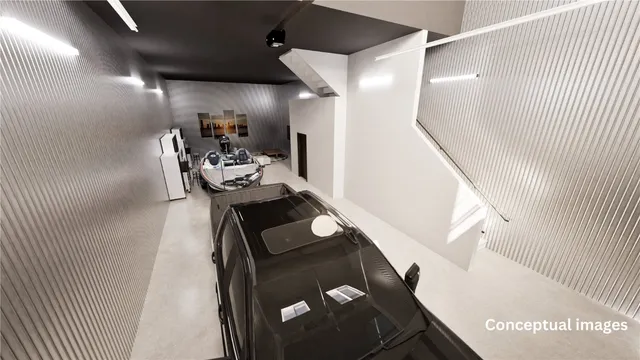 a view of a livingroom with furniture and staircase