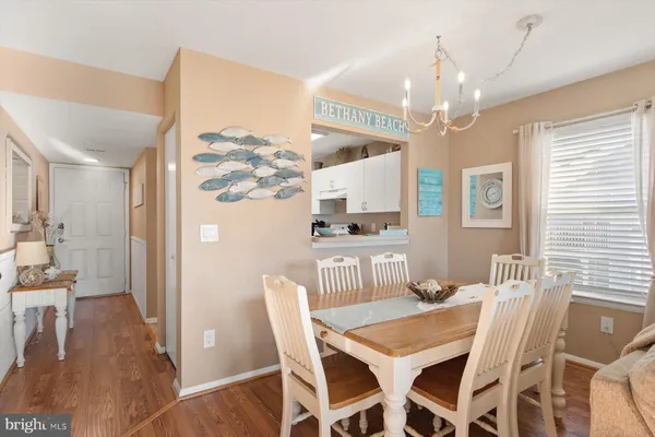 a bedroom with a bed and a lamp