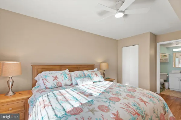 a bathroom with a sink toilet and a mirror