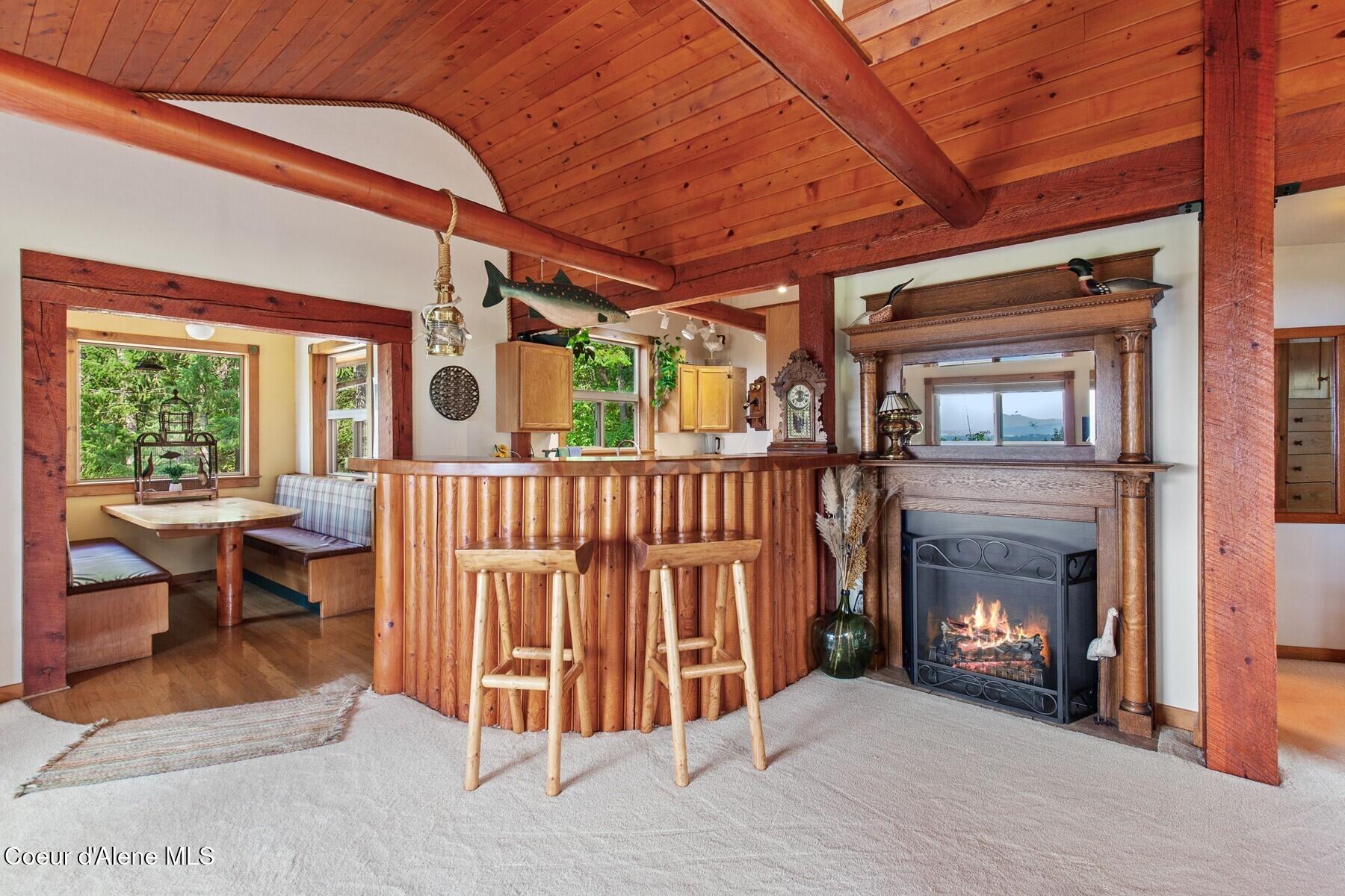 8562 South Gozzer Road Harrison, ID 83833 - Photo 14 of 40 Breakfast Bar w Fireplace