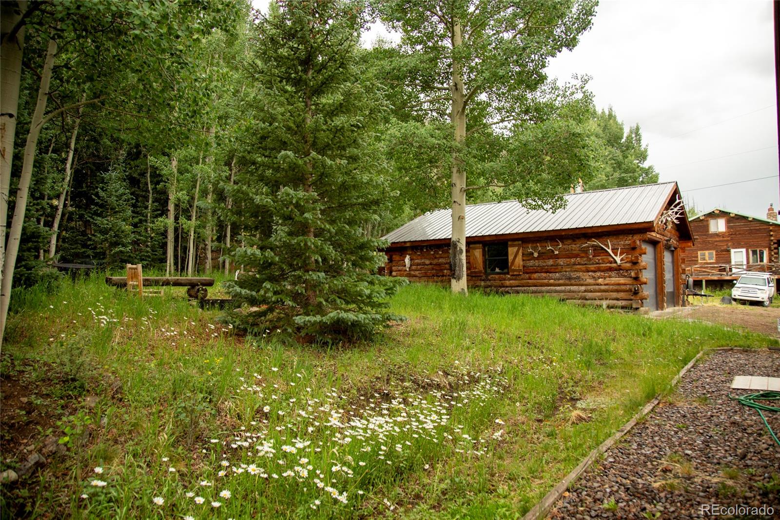 2150 Usfs Road, Unit 18A Creede, CO 81130 - Photo 18 of 25 a front view of a house with garden